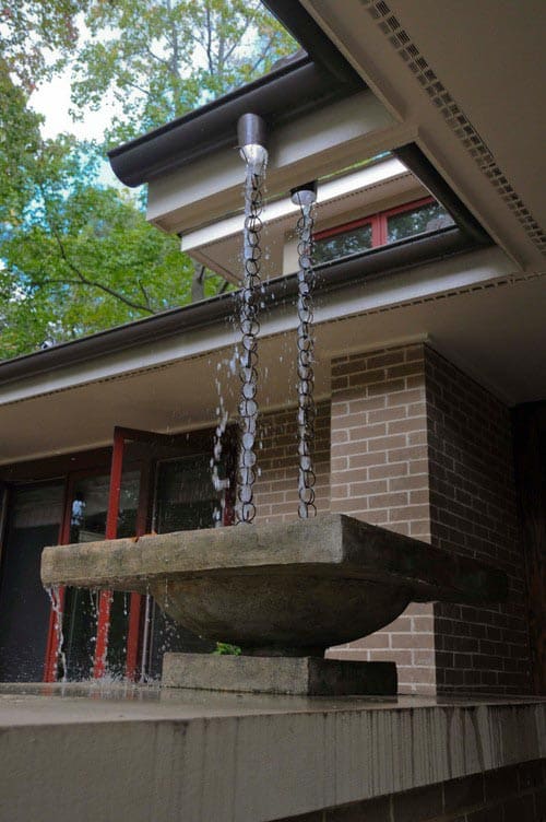 Rain chain on a modern house by Rawlings Design, Inc.