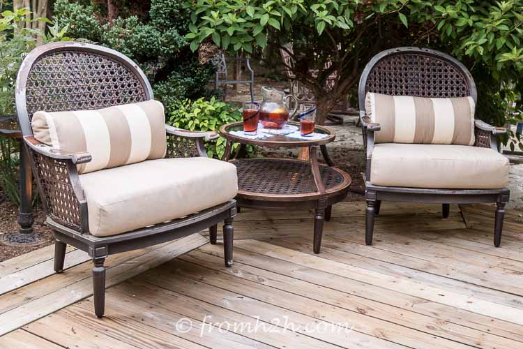 Low maintenance resin "wicker" furniture with cushions on a deck