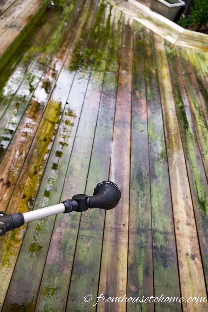 Soak the deck with a hose before starting | The Best (Inexpensive and Eco-Friendly) Homemade Deck Cleaner Ever!