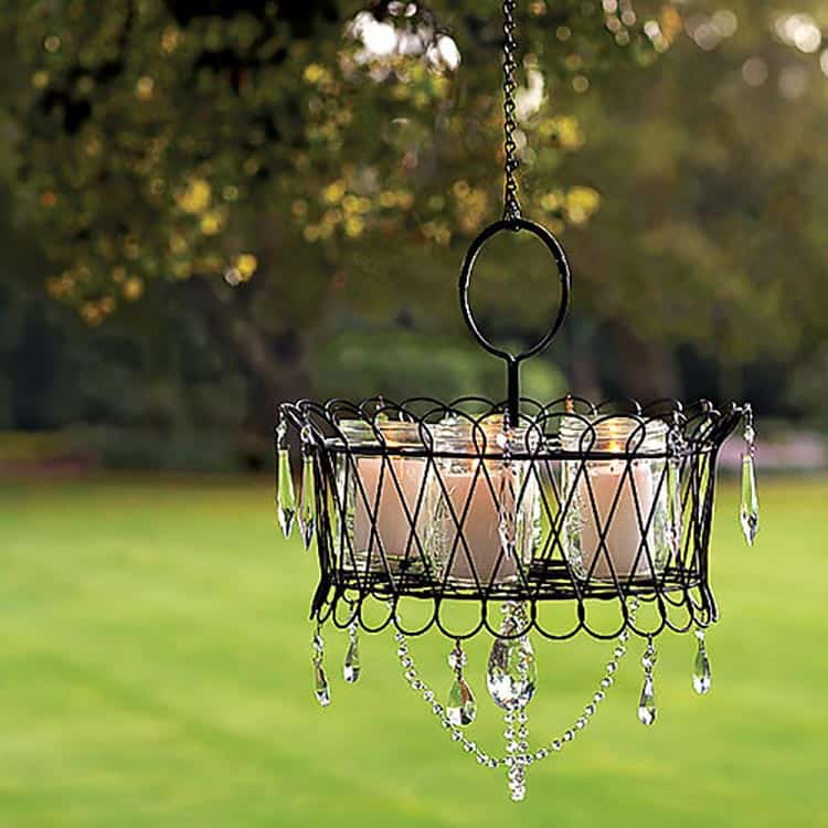 DIY outdoor chandelier, via sunset.com | 10 Beautiful Ways To Light Your Garden