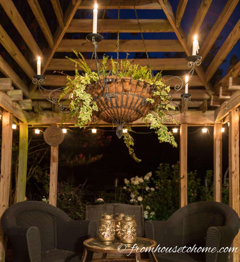 String lights hang from the edge of the gazebo | 10 Beautiful Ways To Light Your Garden