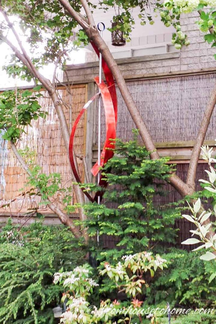 Red modern art in a garden