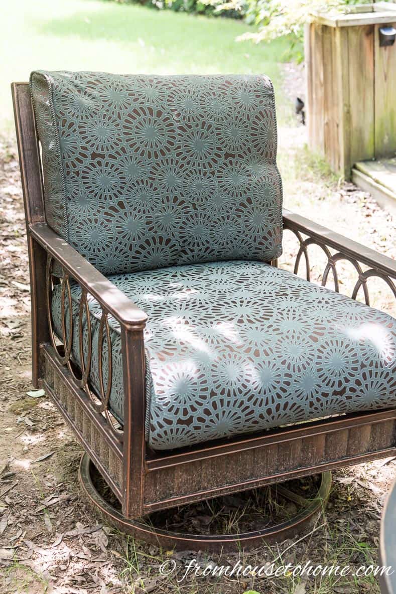 Outdoor chair with turquoise cushion