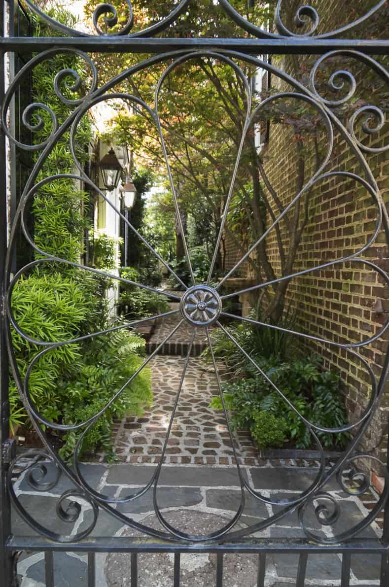 Wrought iron gateway to Charleston secret garden ©balashark - stock.adobe.com