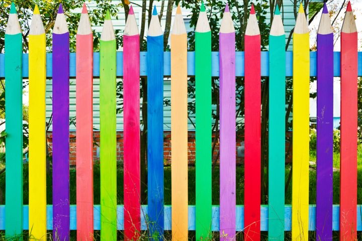 Whimsical privacy fence made to look like pencils