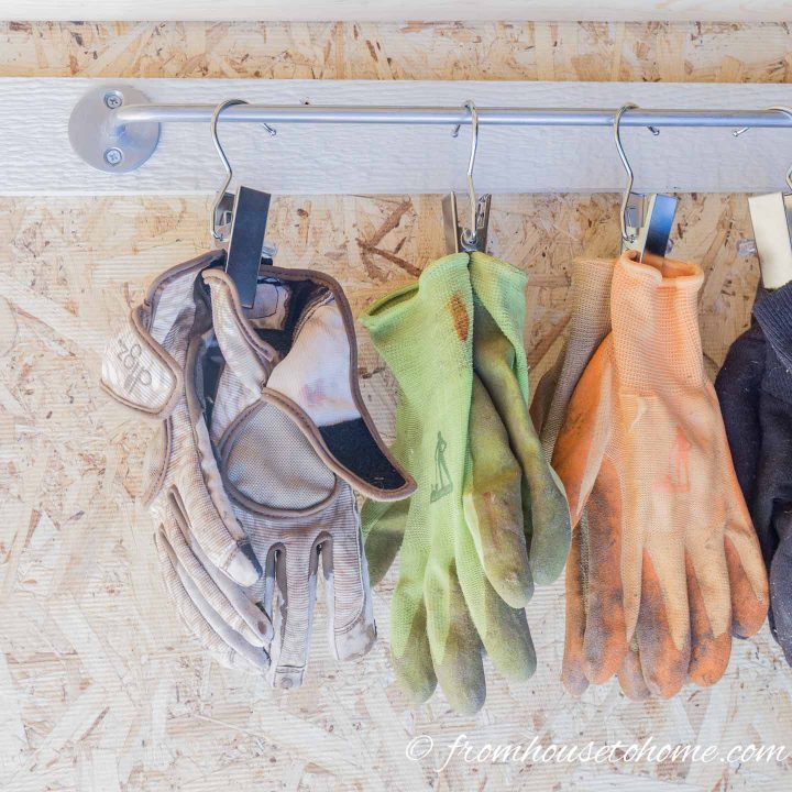 Use clips to hang garden gloves from a bar