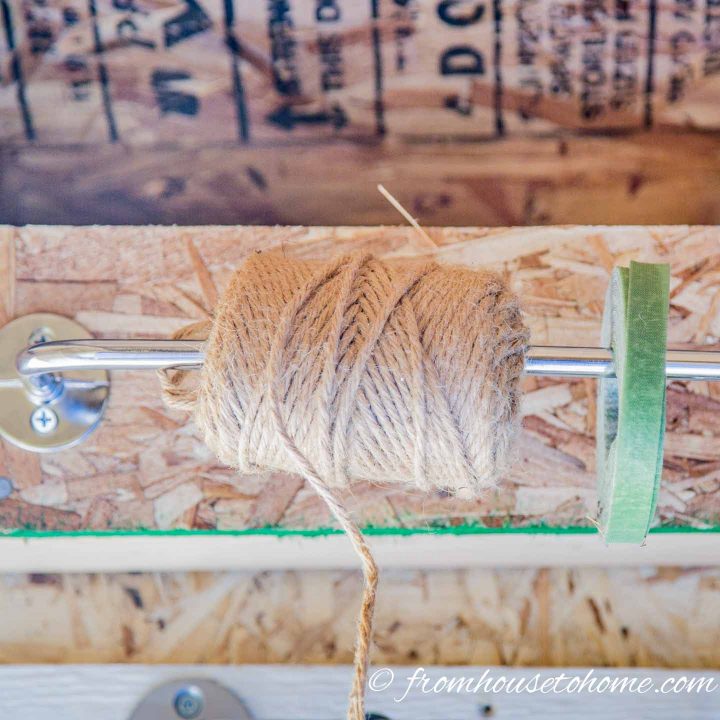 Use a paper towel holder to store string