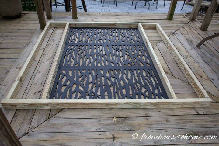 The decorative DIY outdoor privacy screen laid out before construction