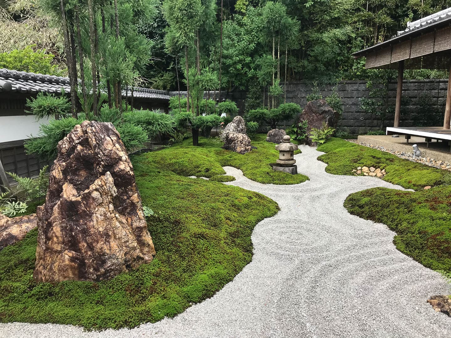 dry river bed with raked gravel in a Japanese zen garden