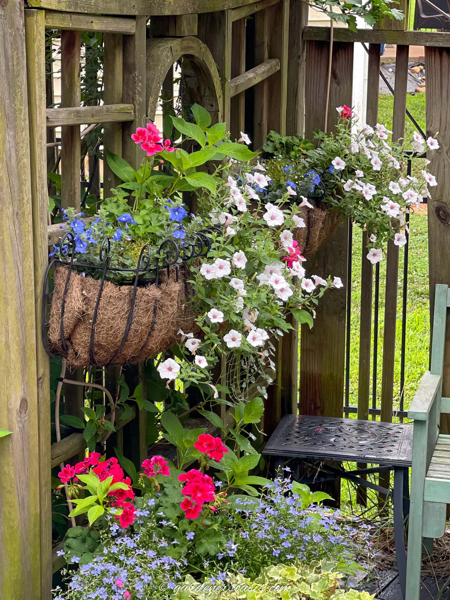 Outdoor planters with an automatic watering system attached