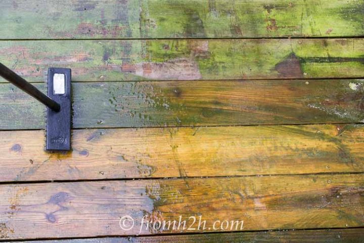 Spread the oxygen bleach solution on the deck with the scrub brush