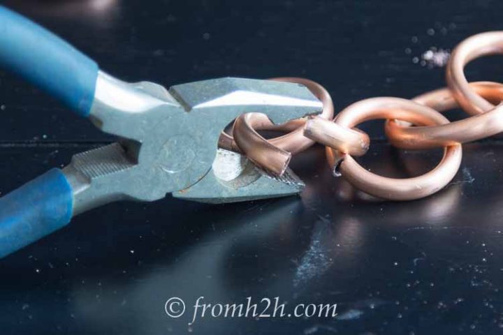 Use pliers to alighn both ends of the link