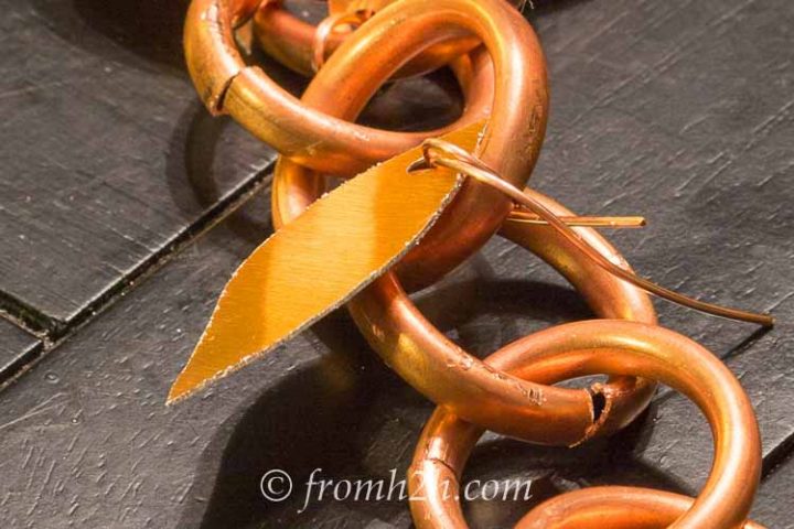 Wrap the copper wire around the link twice