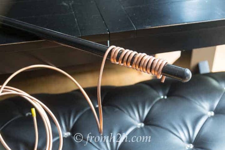 When the tubing has wound over to the other side, rotate it back toward you