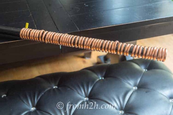 When you have wound all of the tubing around the handle, slide it off