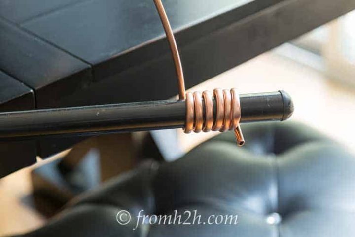 Wind the copper tubing around a broom stick